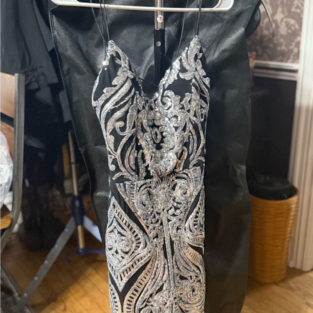 B. Smart Black Dress with Silver Detailing